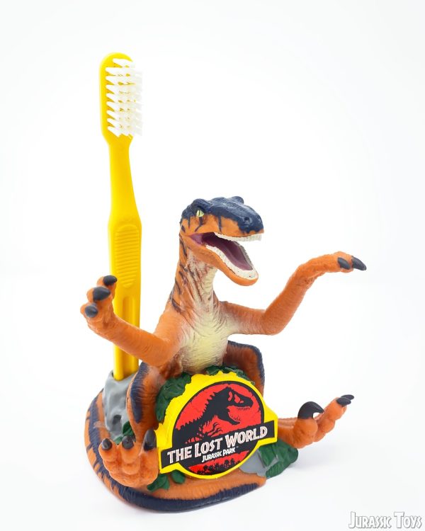 Velociraptor toothbrush holder